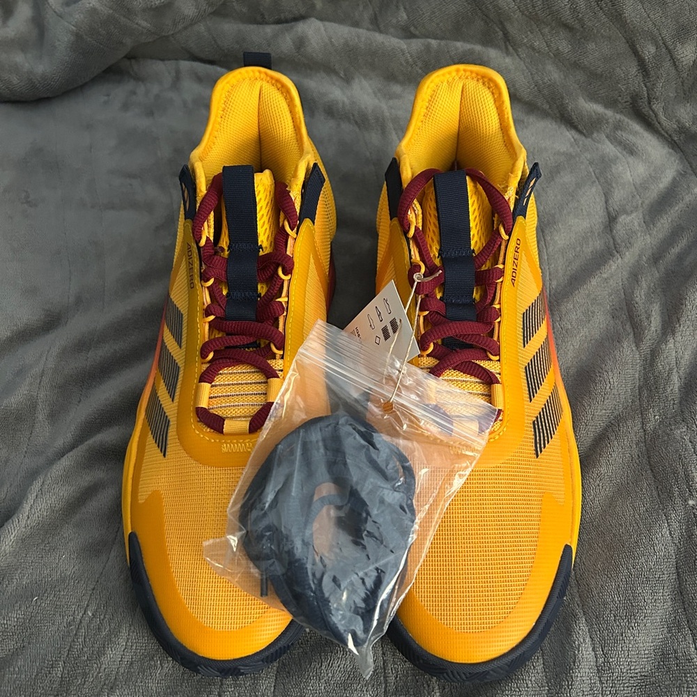 Yellow and Red Athletic Shoes